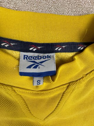 Reebok Sudadera Amarilla Logo Bordado