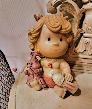 Hucha infantil bebé con biberón y peluche