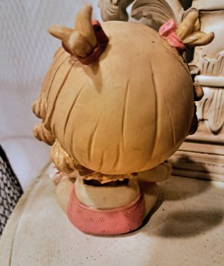 Hucha infantil bebé con biberón y peluche