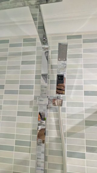 Ducha y rociador de metal y cristal