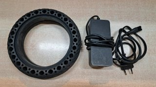 Rueda y cargador patinete eléctrico