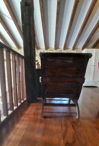 Sillón de madera maciza estilo curvo