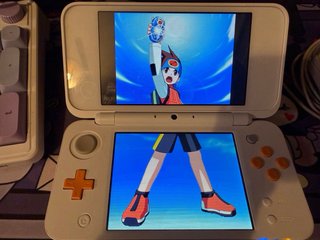 Nintendo 2DS XL Arancione e Bianco
