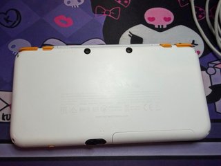 Nintendo 2DS XL Arancione e Bianco