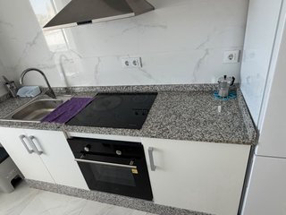 Alquilo atico un dormitorio,obra nueva.
