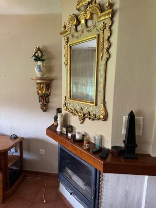 Espejo grande de madera y cristal