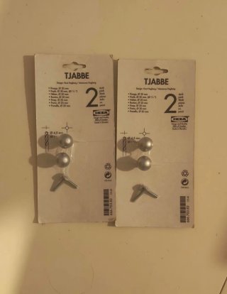 Pomos/tiradores IKEA TJABBE plateados