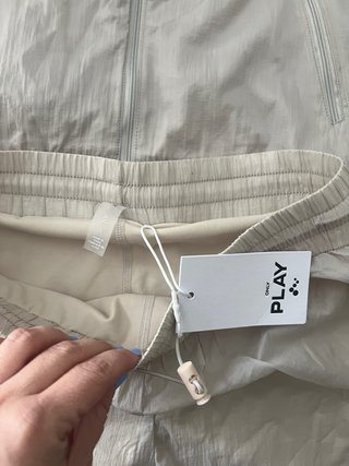 Set Antivento e Pantaloncini da Corsa Beige