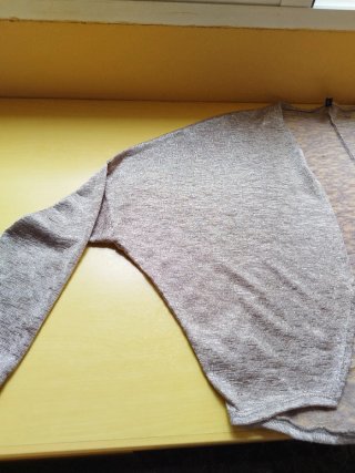 Cárdigan fino beige jaspeado con brillo