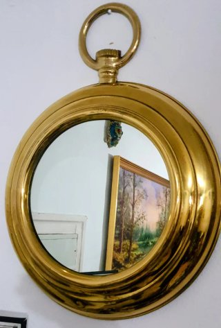Grande espejo de latón dorado de 70cm por 52