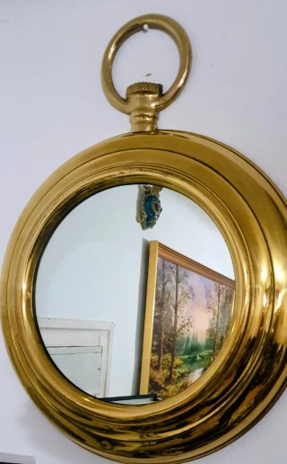 Grande espejo de latón dorado de 70cm por 52