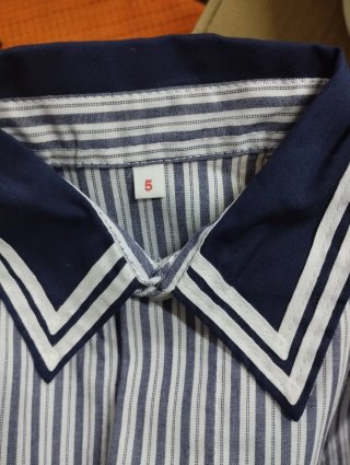 Bata de colegio rayada
