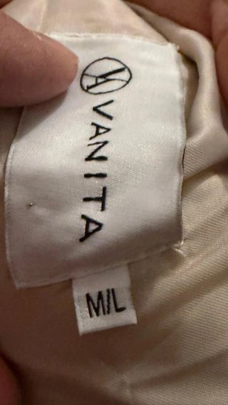 Chaqueta de pelo beige y negra