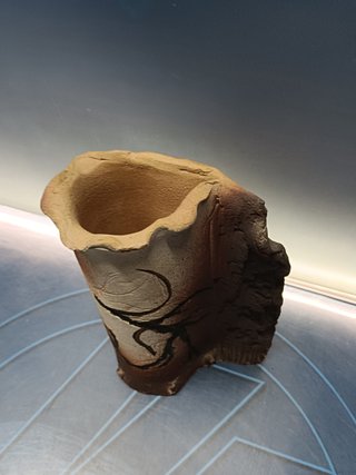 Escultura, florero, cerámica 26 cm.