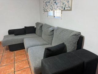 Sofá chaise longue gris y negro