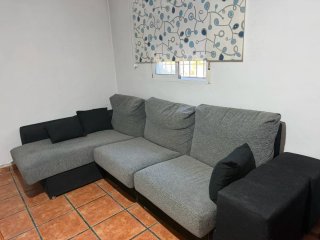 Sofá chaise longue gris y negro