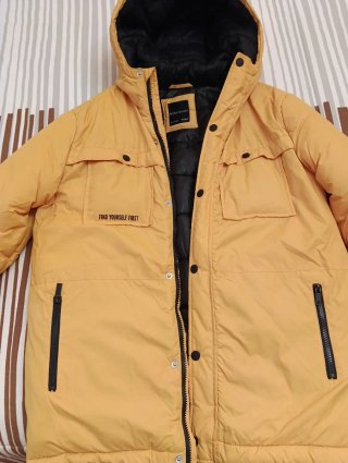 Plumas invierno amarillo talla 16