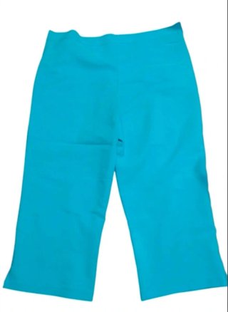 Pantaloni cropped teal con pizzo