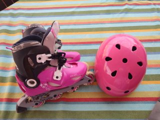 Patines rosas y casco rosa Oxelo