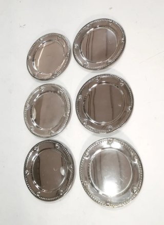 Conjunto de bonitos posavasos antiguos alpaca