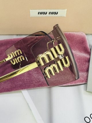 Gafas Miu Miu Doradas Rosadas