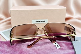 Gafas Miu Miu Doradas Rosadas