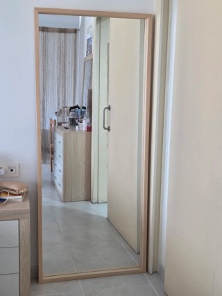 Espejo grande de madera y cristal