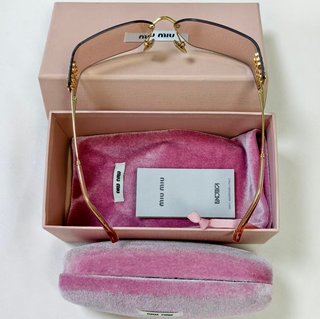 Gafas Miu Miu doradas sin montura
