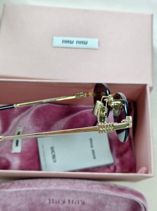 Gafas de sol Miu Miu ovaladas sin montura