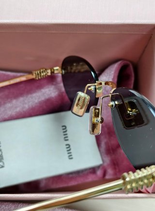 Gafas de sol Miu Miu ovaladas sin montura