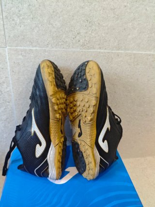 Zapatillas Joma multitacos niño negro/dorado