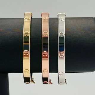 PULSERA RIGIDA TORNILLO ORO ROSA. Hueca. Oro 18k.