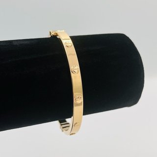 PULSERA RIGIDA TORNILLO ORO AMARILLO. Hueca. 18K.