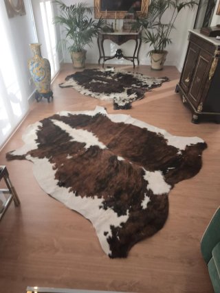 2 alfombras piel vaca