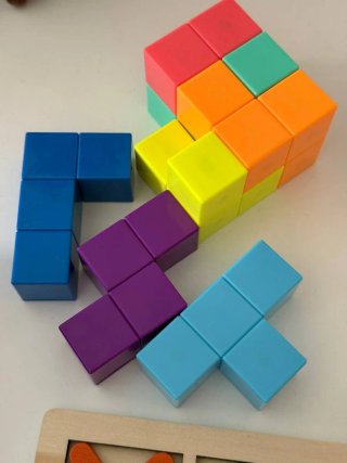 Lote de juguetes: Cubo, Tic Tac Toe, Balancín