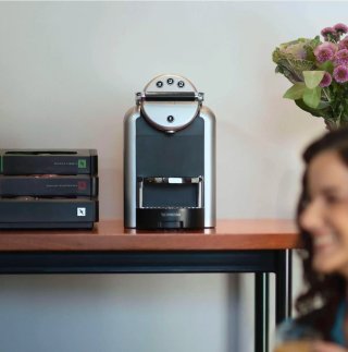 Cafetera Nespresso con cápsulas