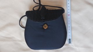 Bolso fiesta mini clutch negro con borlón