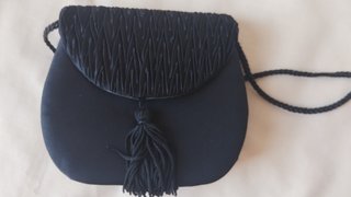 Bolso fiesta mini clutch negro con borlón