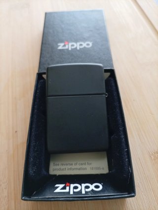 Isqueiro Zippo com foto de guitarrista