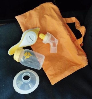 Sacaleches Medela Manual + Bolsa Naranja