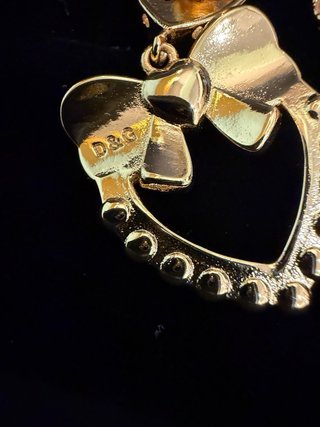 Orecchini cuore con fiocco e perle