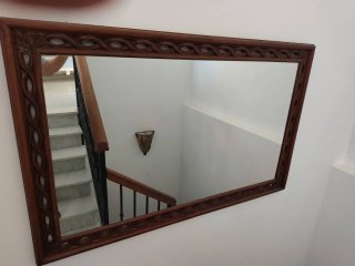Espejo de madera tallada