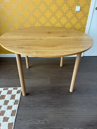 Mesa de comedor redonda de madera