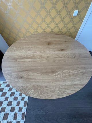 Mesa de comedor redonda de madera