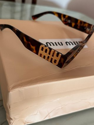 Gafas de Sol Miu Miu Tortoise y Dorado