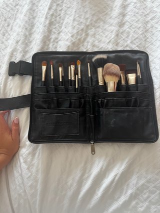 Manta de maquillaje y pinceles sin estrenar