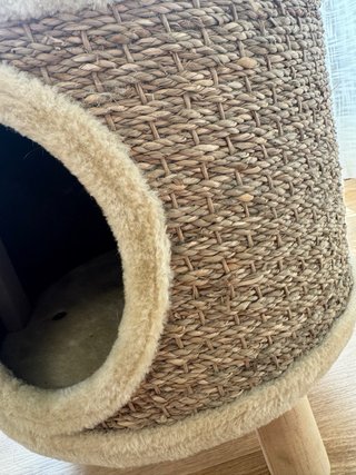 Cama para gato con entrada redonda
