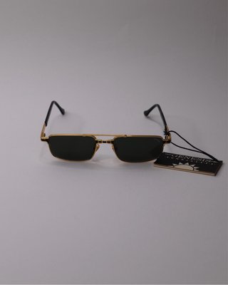 Gafas de sol vintage Genesis doradas