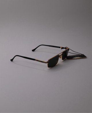 Gafas de sol vintage Genesis doradas