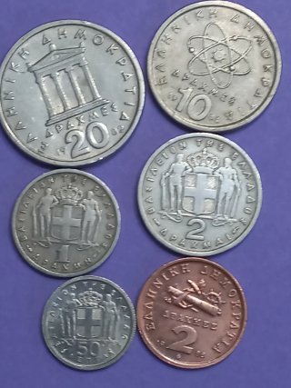 Monedas antiguas griegas Pericles y Demócrito
